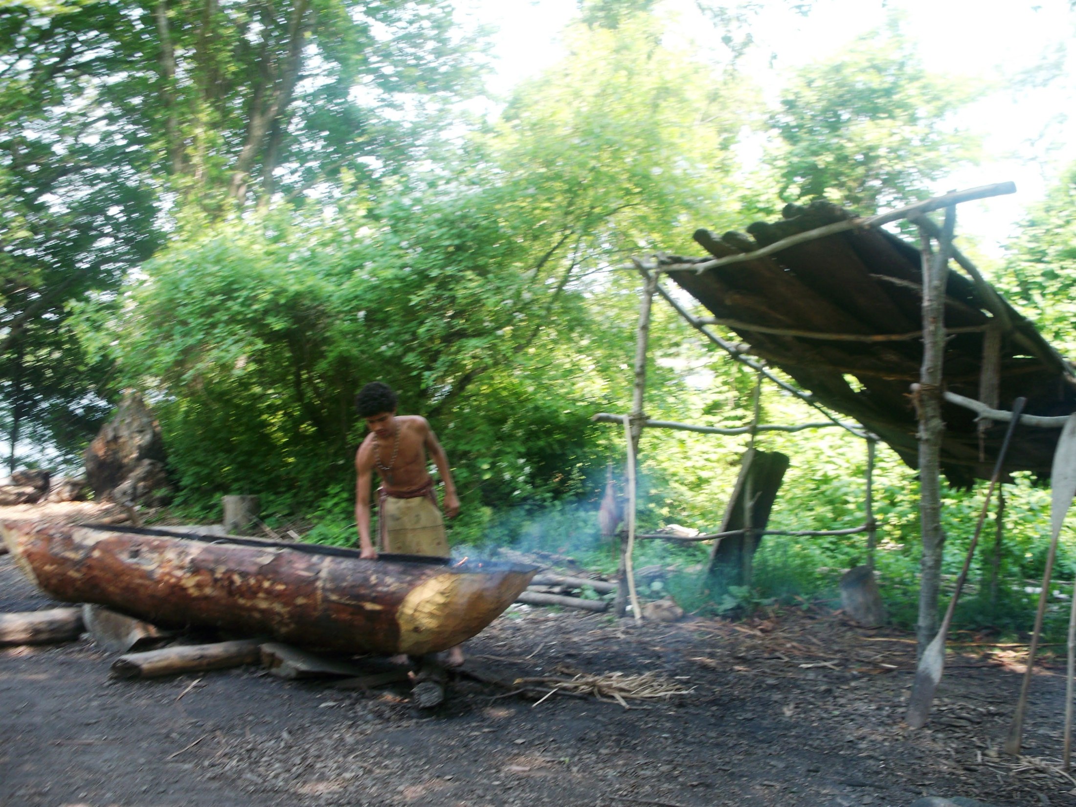 A Wampanoag canoe-making demonstration at Plimoth Patuxet Museums
